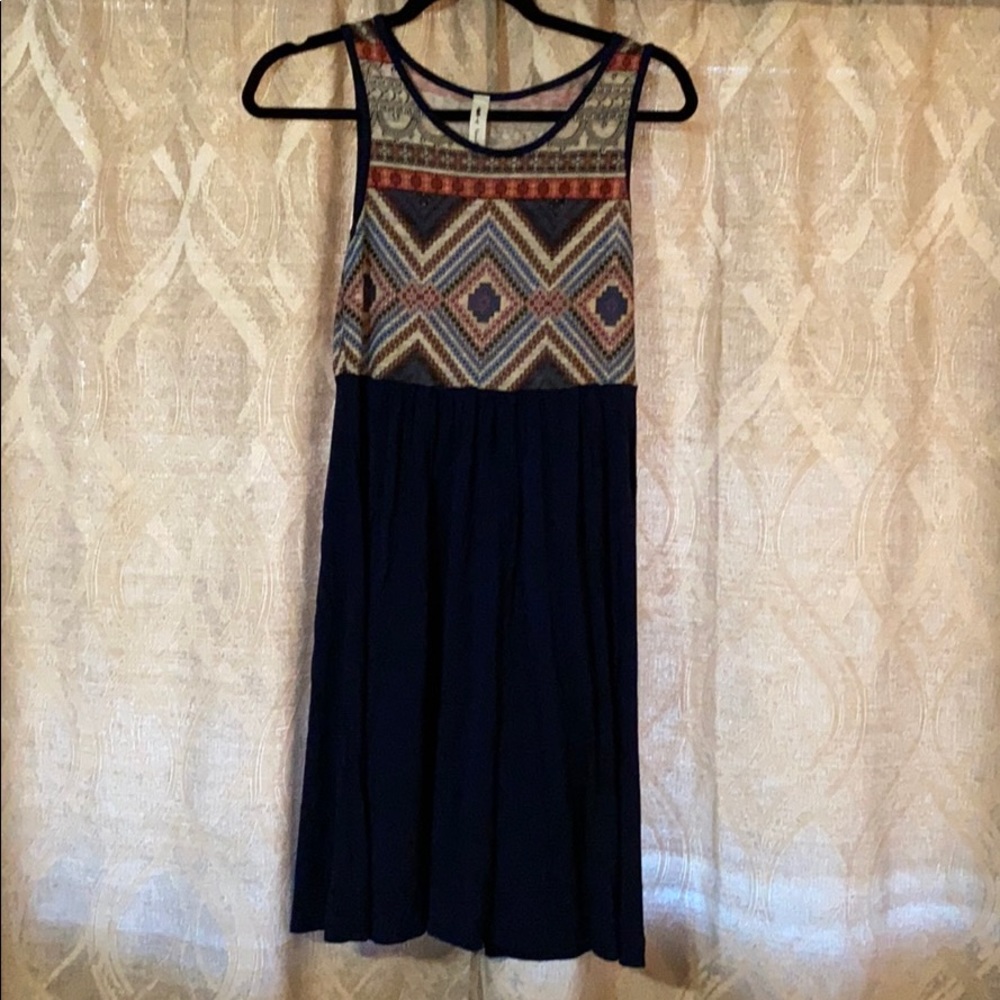 Navy dress, with print detail on top